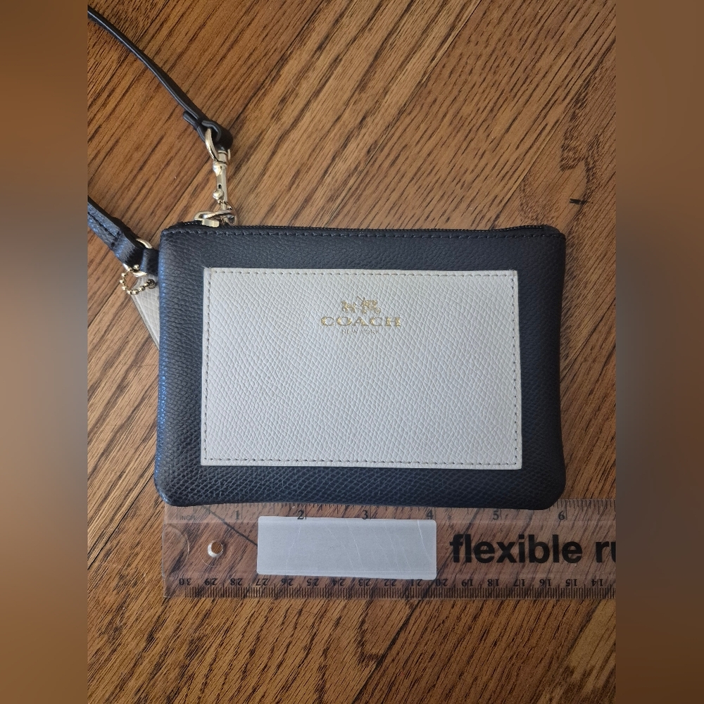 Coach wristlet navy and cream leather
